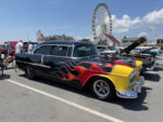 012 1955 Chevrolet Bel Air in black with vibrant hot rod flames and a massive roots blower