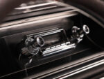012 1965 Chevrolet Impala SS retro style radio close up with chrome detailing preserving vintage dashboard aesthetics