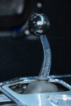 012 1966 Chevrolet Corvette Hurst shifter close up iconic chrome design with polished details and race inspired styling