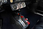 012 1967 Chevrolet Nova SS interior showing center console additional gauges and a mounted fire extinguisher