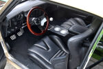 012 1969 Camaro interior black leather seats woodgrain steering wheel modernized cockpit