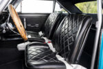 012 Black diamond stitched interior seats in a 1966 Chevy Nova with classic wood steering wheel and performance shifter