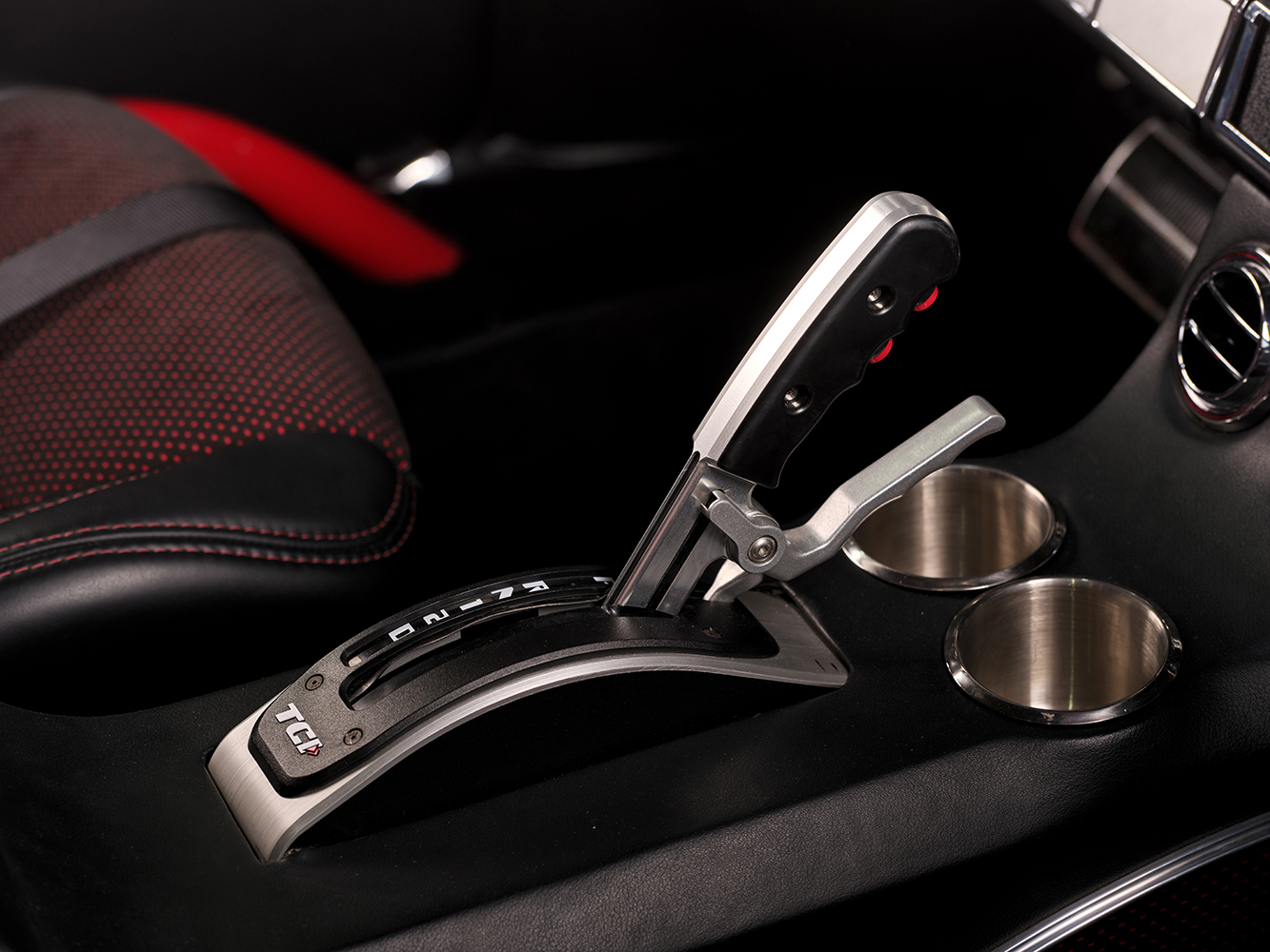 013 1965 Chevrolet Impala SS TCI shifter modern design integrated into custom center console with dual cupholders