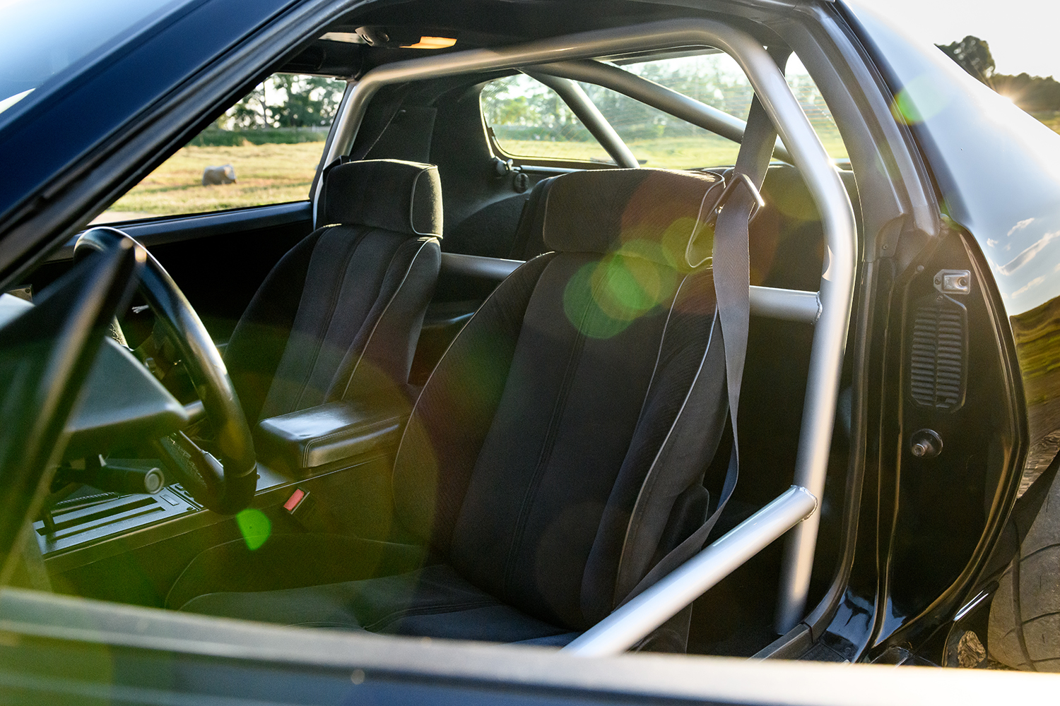 013 1986 Camaro IROC Z interior with race ready roll cage and reinforced safety structure