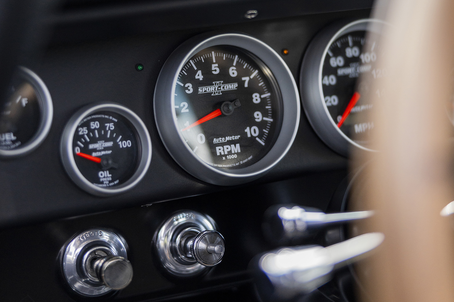 013 AutoMeter Sport Comp gauges in 1966 Chevy Nova dash showing RPM oil pressure and speedometer for precision monitoring