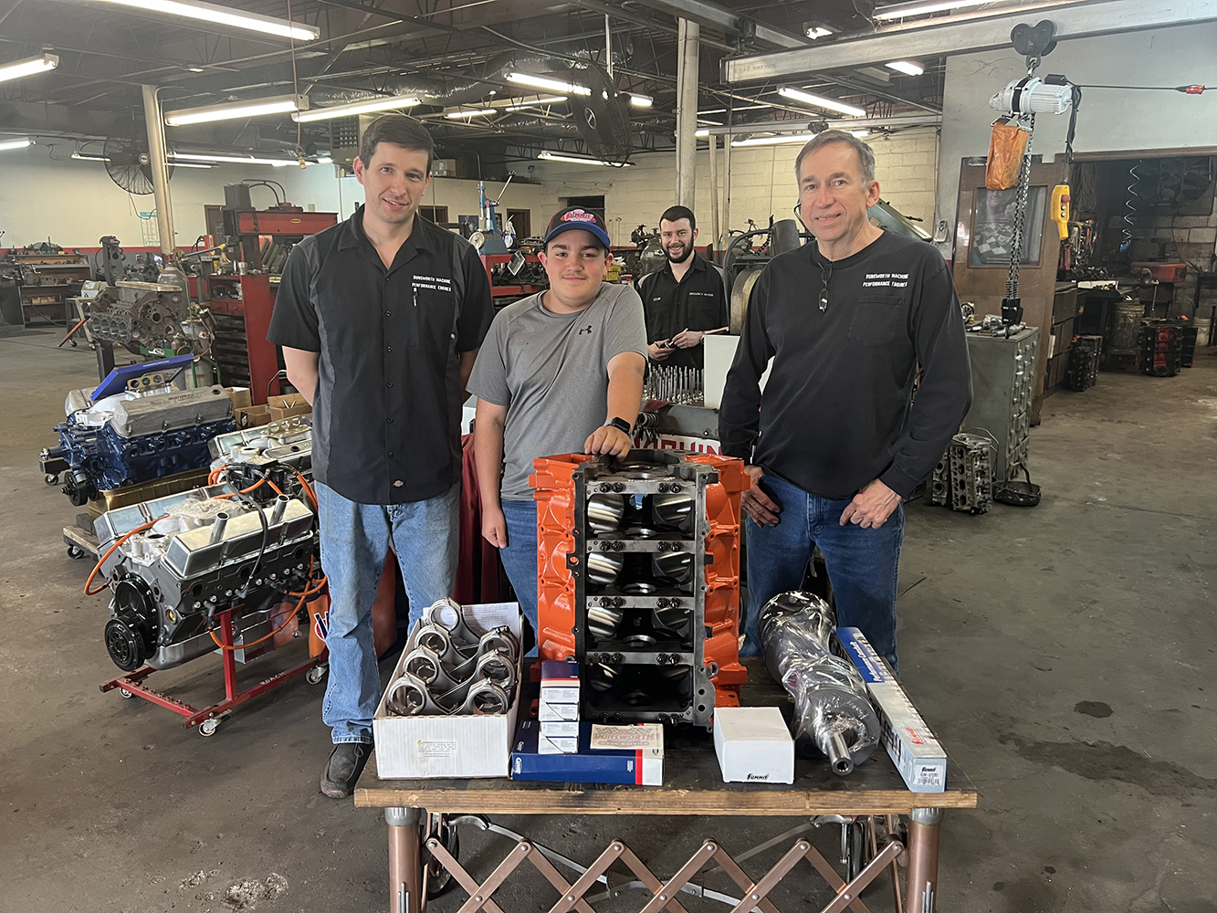 013 Engine shop team with LS engine block performance build pistons rods crankshaft setup