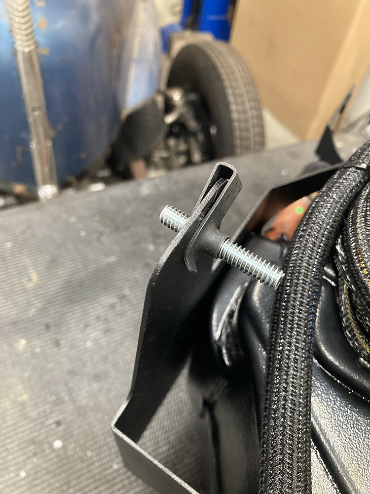 013 Fastening a mounting bracket to the Vintage Air evaporator housing