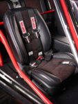 015 1965 Chevrolet Impala SS racing seat with Simpson harness custom upholstery and integrated roll cage in red