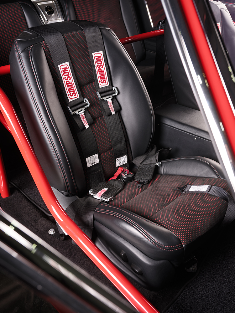 015 1965 Chevrolet Impala SS racing seat with Simpson harness custom upholstery and integrated roll cage in red