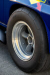 015 1966 Chevrolet Corvette Mickey Thompson rear tires on period correct racing wheels emphasizing performance and traction