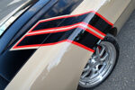 015 1969 Camaro black and red racing stripes fender close up aggressive design