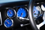 015 1969 Chevrolet Camaro close up of blue performance gauges showcasing precision instrumentation for engine monitoring