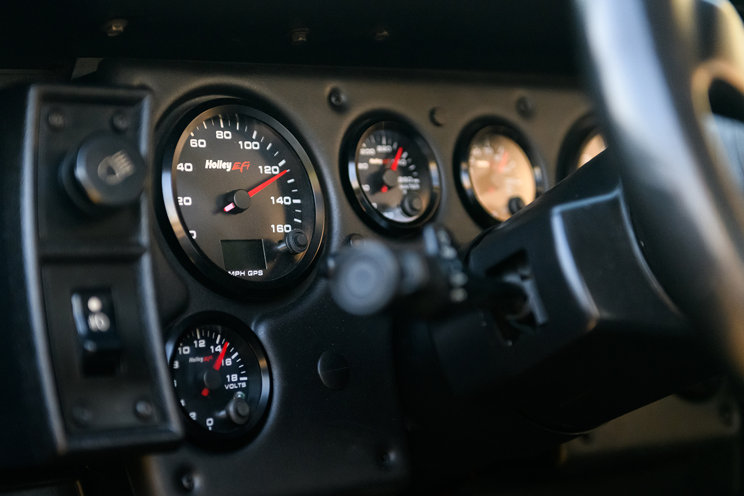 015 1986 Camaro IROC Z Holley EFI instrument cluster provides real time performance monitoring