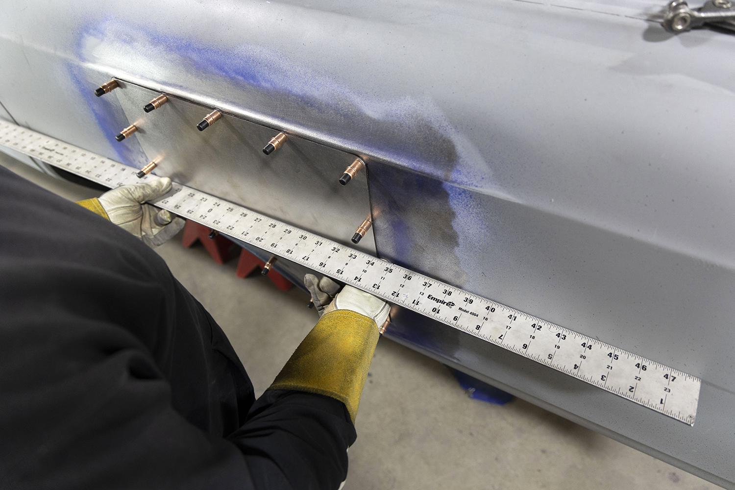015 Straightedge is used to verify proper alignment of the patch panel before final welding