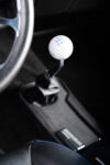 016 1969 Chevrolet Camaro Hurst shifter with six speed pattern emphasizing the modernized drivetrain