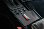 016 1986 Camaro IROC Z center console with classic power window controls and tri color Chevy emblem