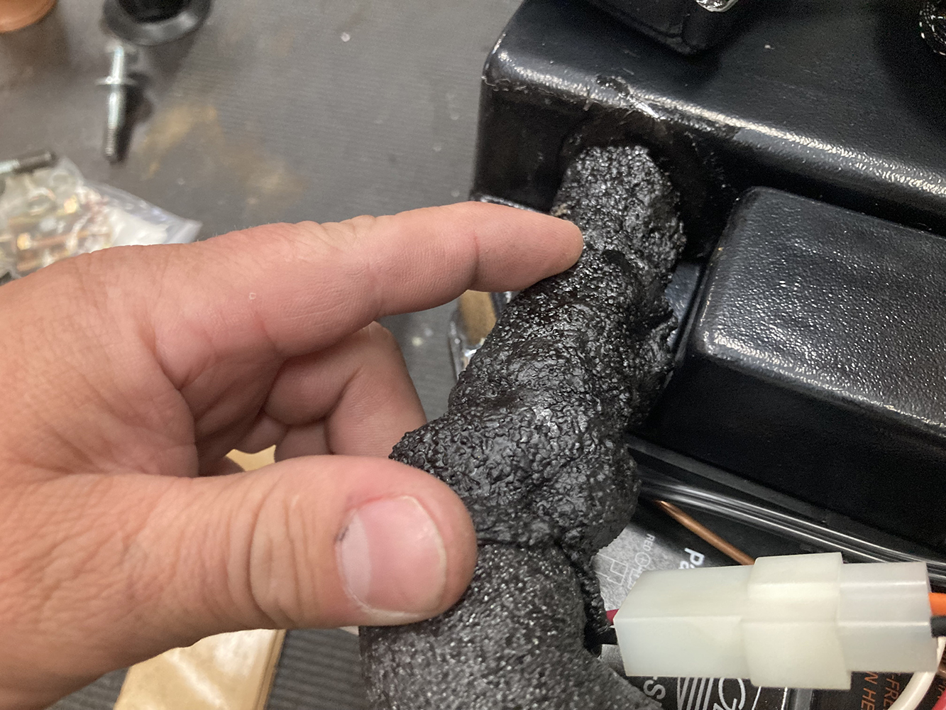 016 Sealing an AC hose connection with insulating foam wrap