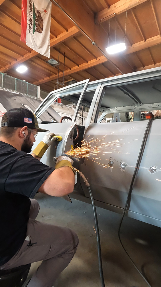 016 Smoothed door edge welds visible showing precise alignment work