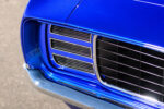 019 1969 Chevrolet Camaro front grille detail with chrome accents emphasizing its timeless muscle car style