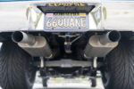 019 Dual rear exhaust tips under a 1966 Chevy Nova with a custom California 66QUAKE license plate