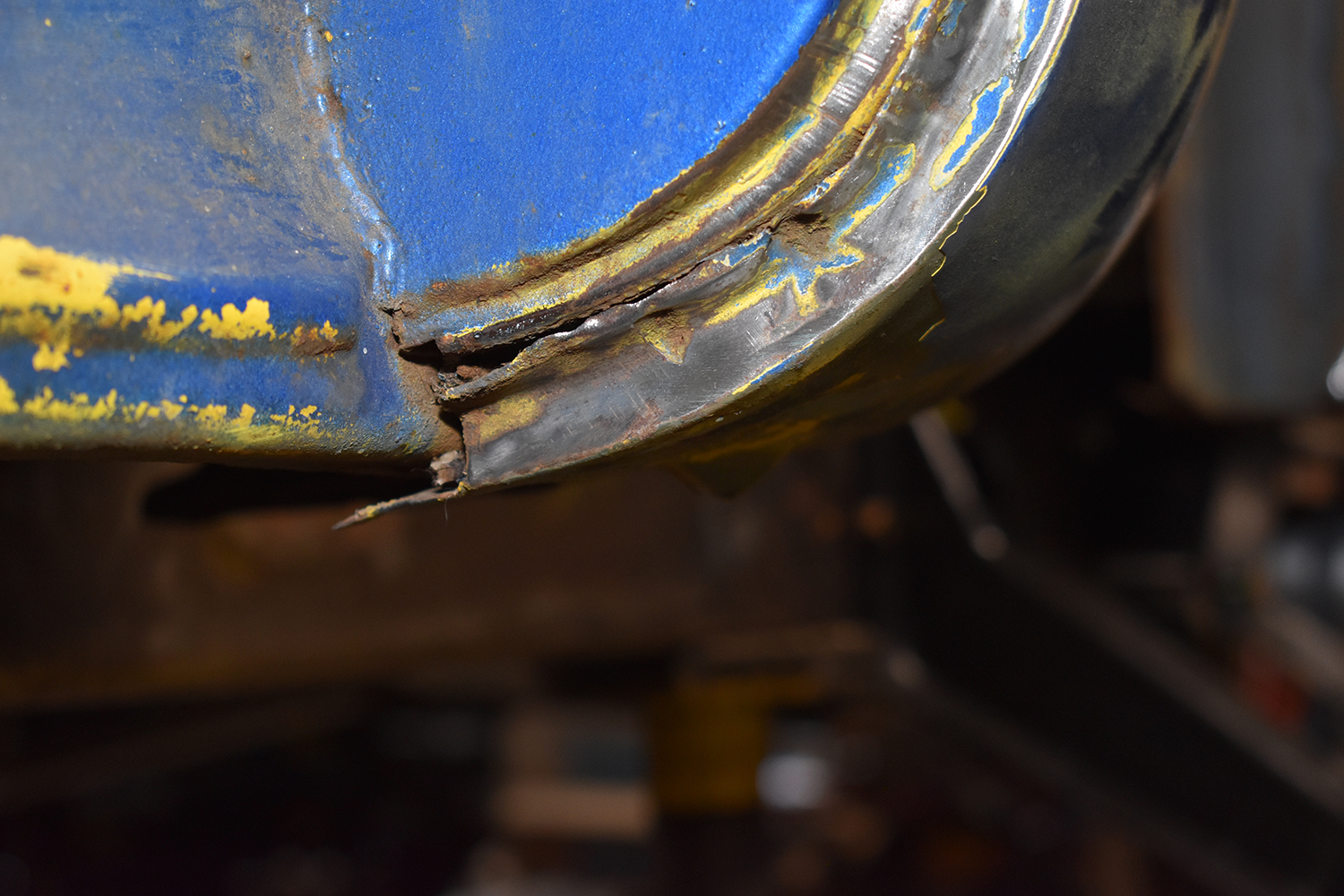 02 Close up of corroded and split metal on the truck s cab