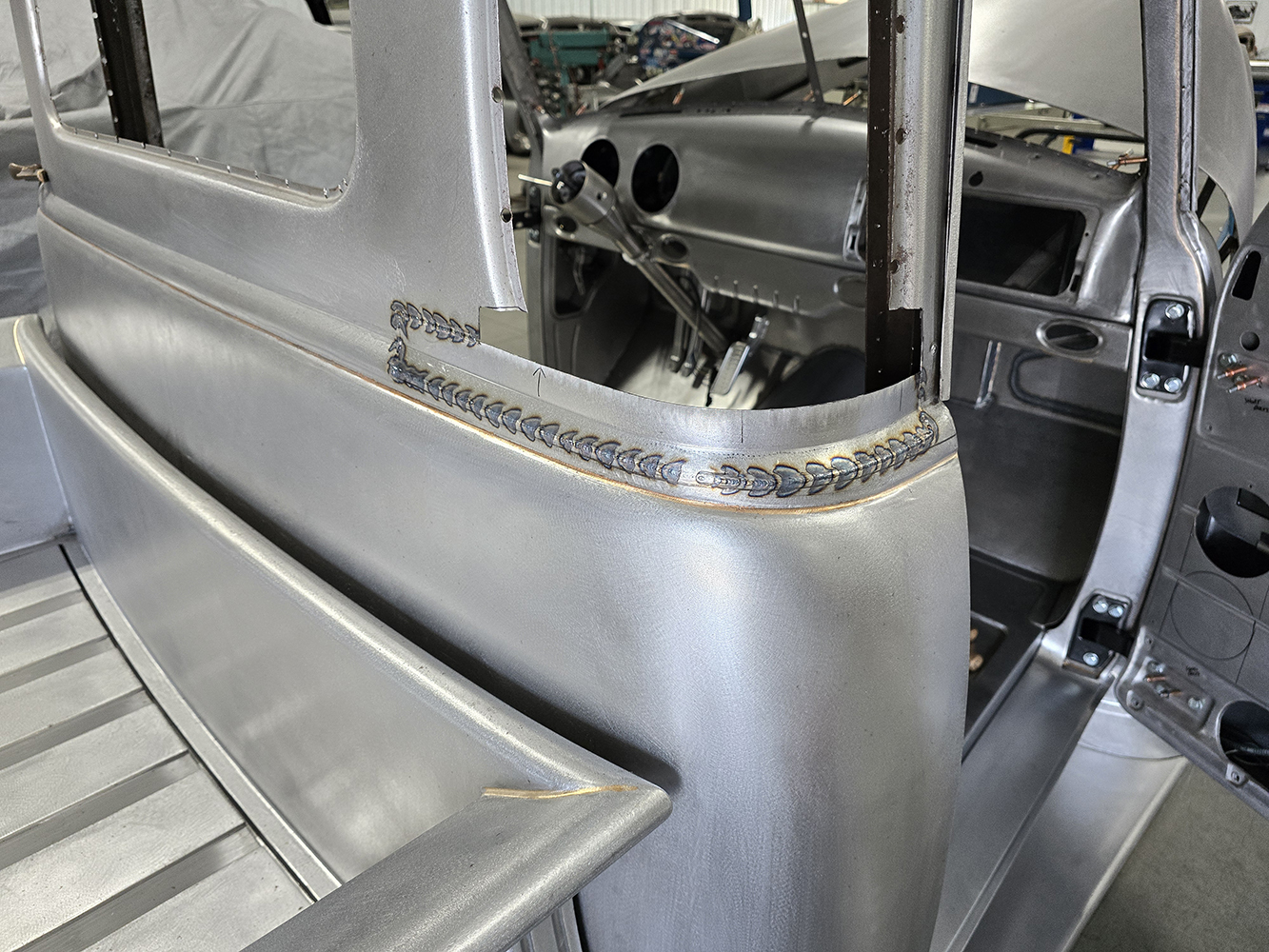 02 Detailed TIG welding on the cab’s modified rear window section