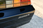 020 1986 Camaro IROC Z close up of Z28+ badge emphasizing upgraded performance package