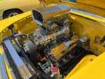 020 Chrome Weiland blown V8 in a yellow hot rod polished to perfection with billet pulleys and dual carbs
