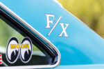 020 FX and Moon logo decals on the rear quarter window of a 1966 Chevy Nova showcasing drag racing style
