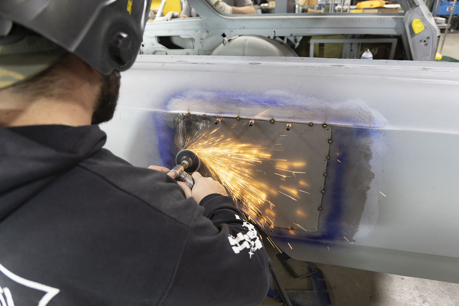 020 Final grinding process smooths out the welds completing the fuel door delete modification
