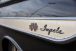 021 1961 Chevrolet Impala SS badging with chrome trim and red SS emblem on a black and white side panel