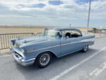 022 1957 Chevrolet Bel Air in glacier blue with polished Torq Thrust wheels and gold trim
