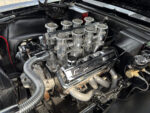 028 High rise EFI intake setup on a Chevrolet small block with velocity stacks and polished runners