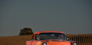 03 1957 Chevrolet Bel Air front view with classic dual headlights and a smooth shaved bumper