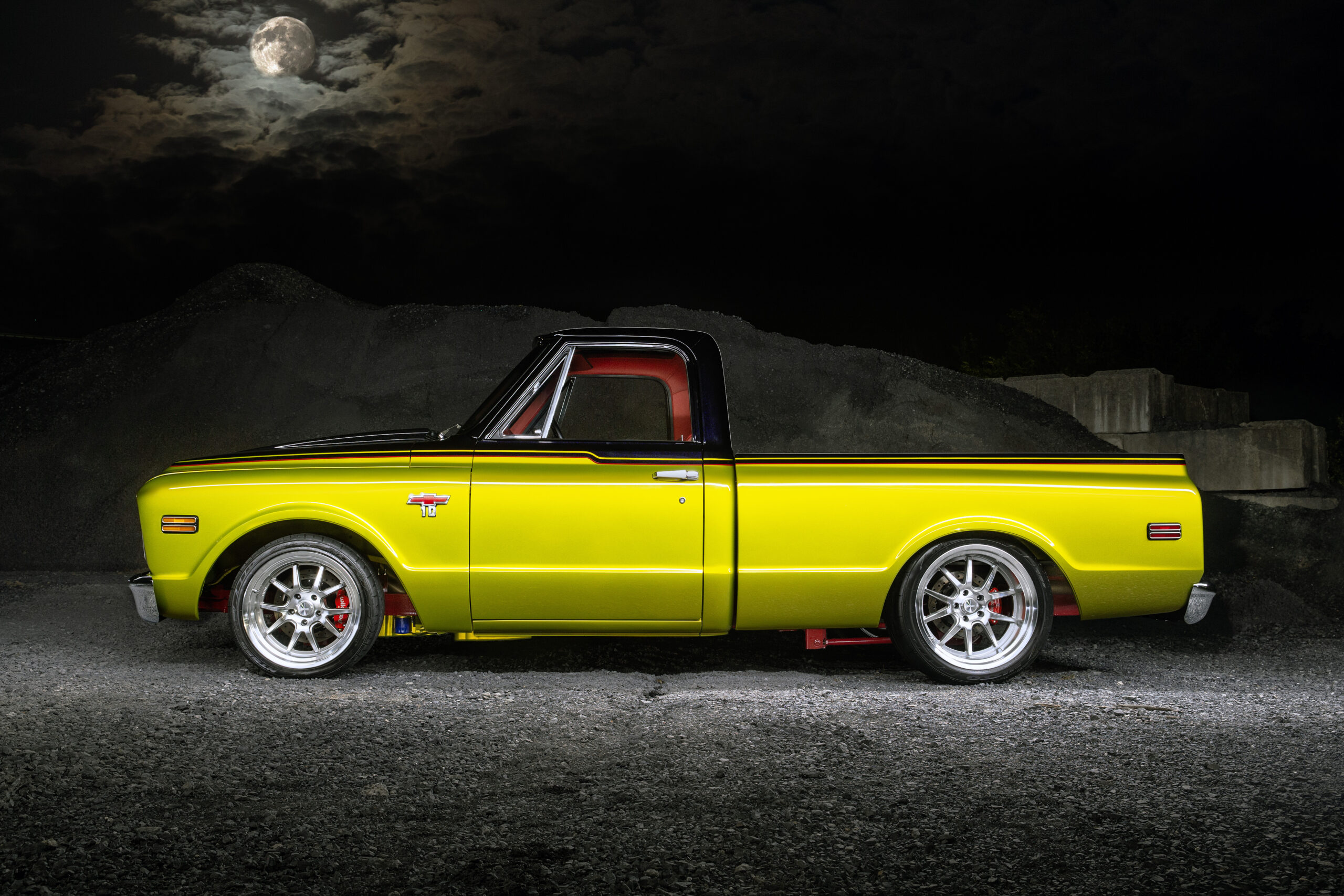 03 1968 Chevrolet C10 sleek side profile with lowered suspension and custom paint