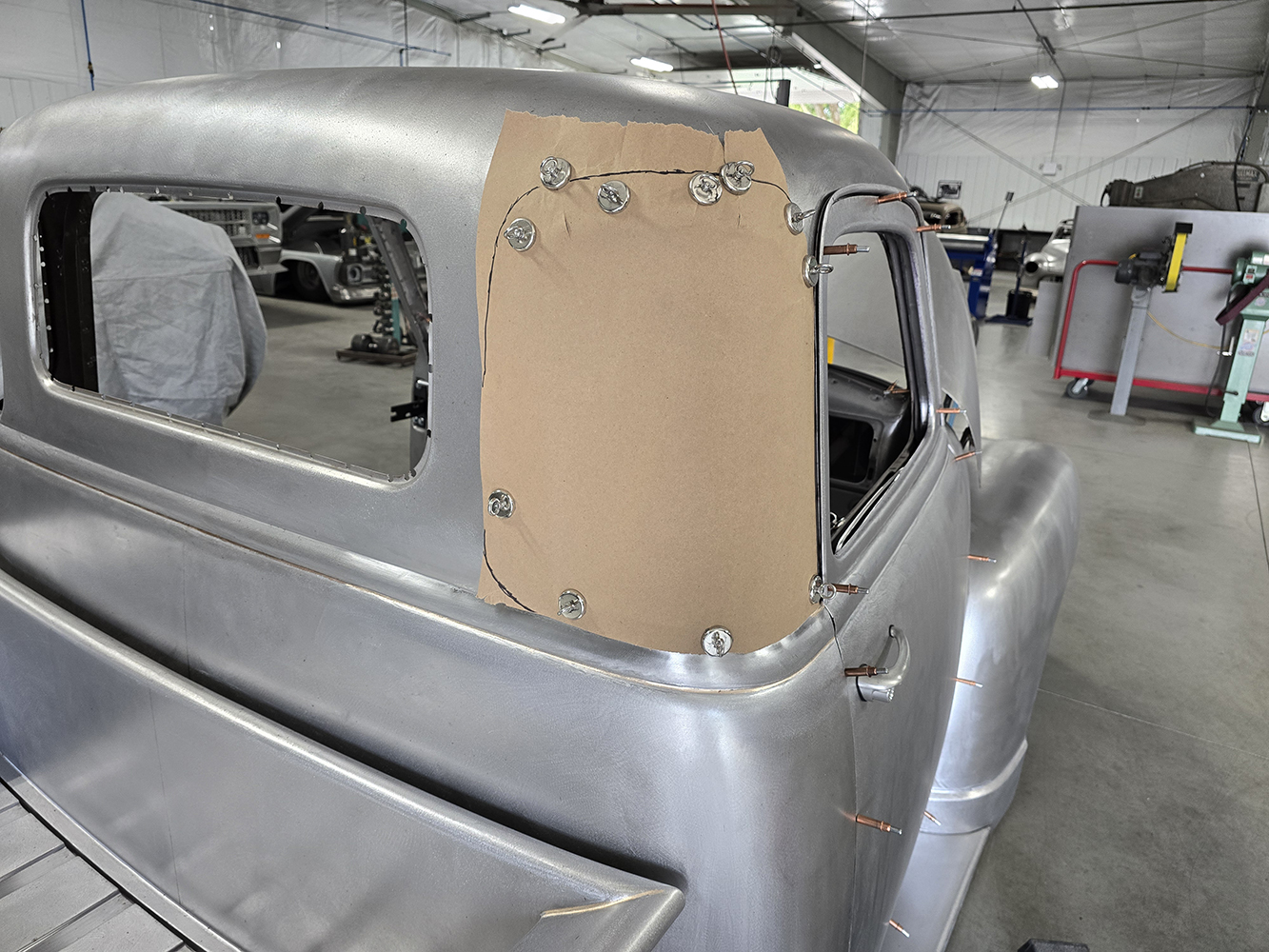 03 Cardboard template clamped to the cab for rear window modification