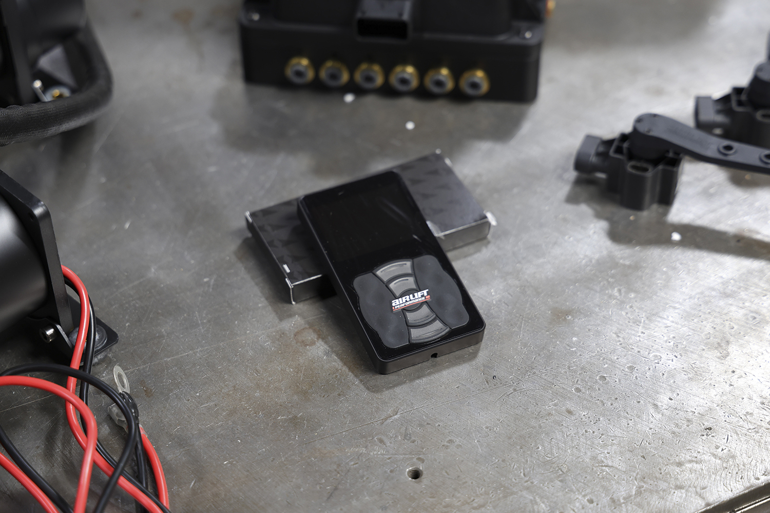 04 Air Ride Controller Air Lift Performance remote for easy height adjustments