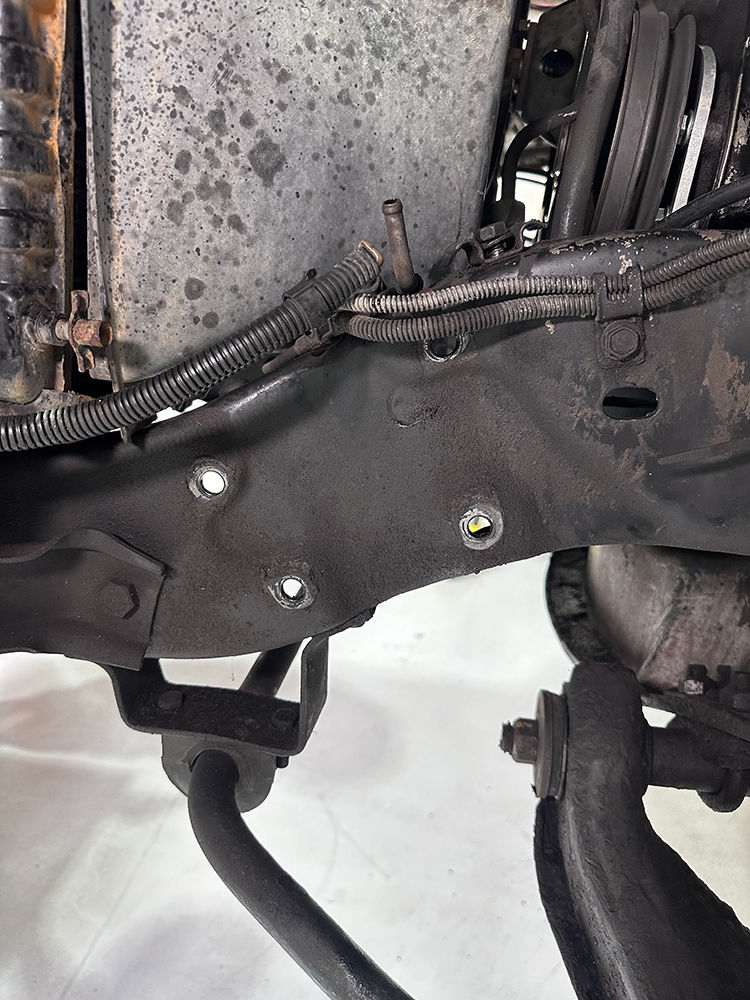 04 Frame rail with old steering box removed ready for the new rack installation