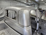 04 Seam welded roof panel with a reshaped rear window opening