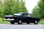 05 1957 Ford Custom rear showcasing classic round taillights chrome bumper and dual exhaust tips