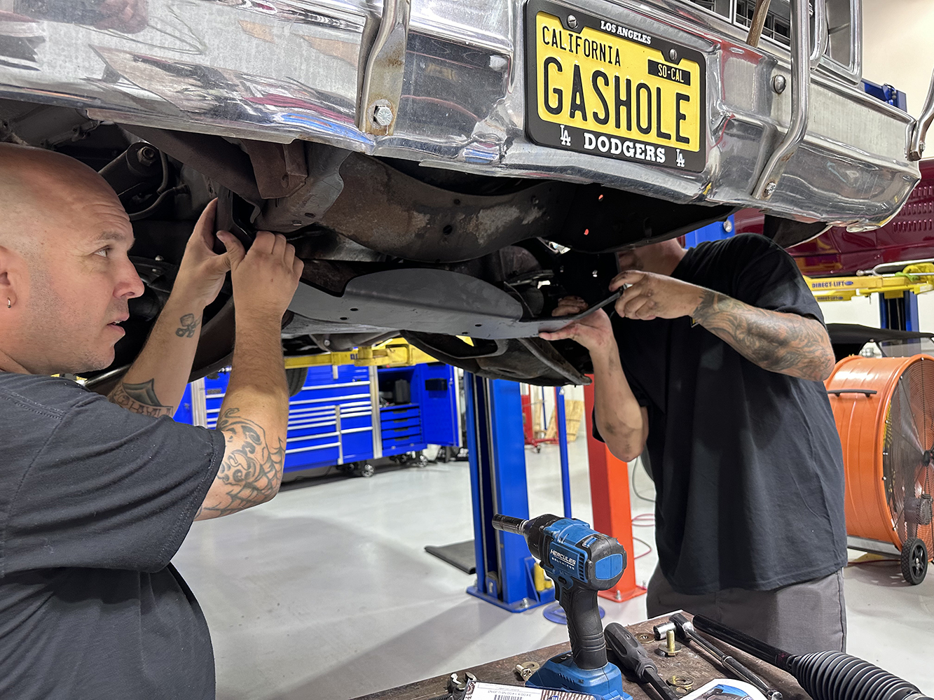 05 Mechanics test fitting a new rack and pinion bracket on the truck’s frame
