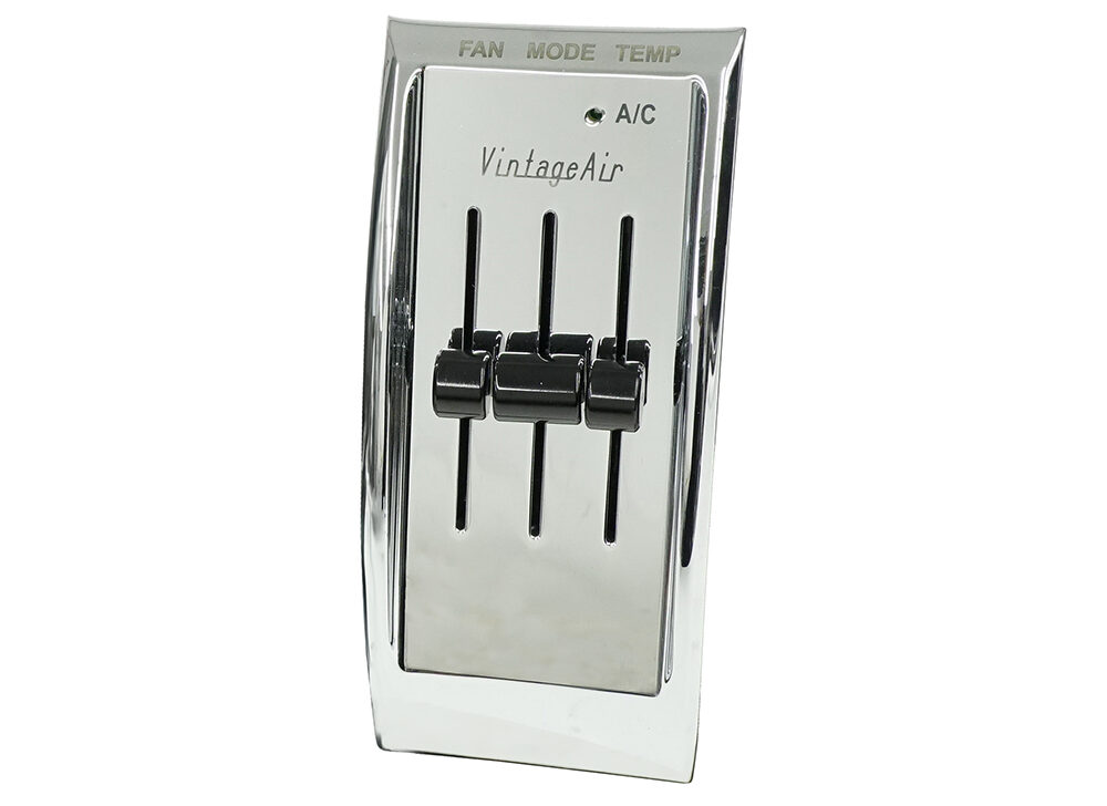 05 Vertical Vintage Air chrome control panel with three sliding levers for fan speed mode selection and temperature regulation