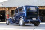 06 1932 Ford Tudor rear view displaying clean bodywork custom taillights and dual exhaust