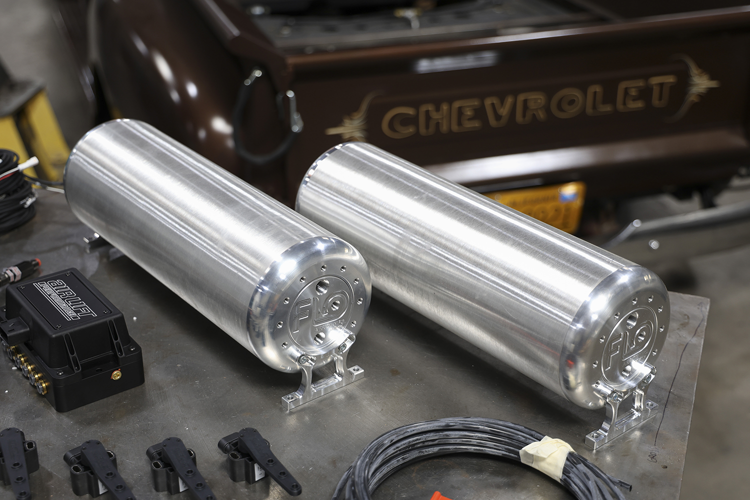 06 Polished Air Tanks FLO billet aluminum air tanks adding style and function