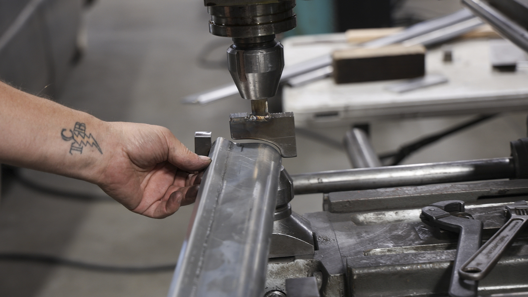 06 Using a press tool to shape a custom metal part for a 1962 Chevy Impala
