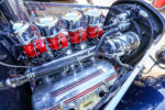 08 1932 Ford Tudor close up of the polished Ardun valve covers and fuel system