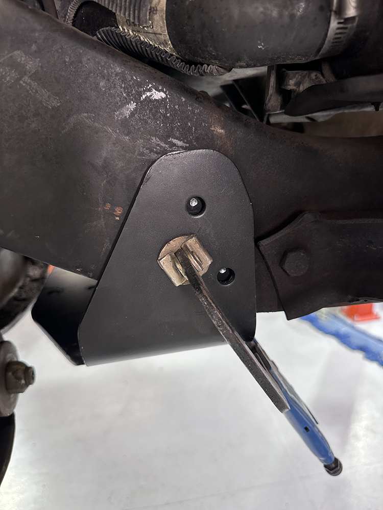 08 Close up of new steering stabilizer bracket with an adjustable suspension link attached