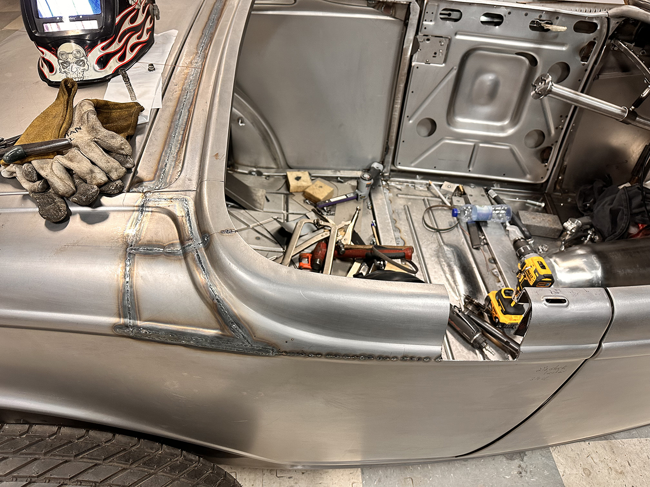 08 Detailed welding work shaping the custom quarter panel of a 1932 Ford Roadster