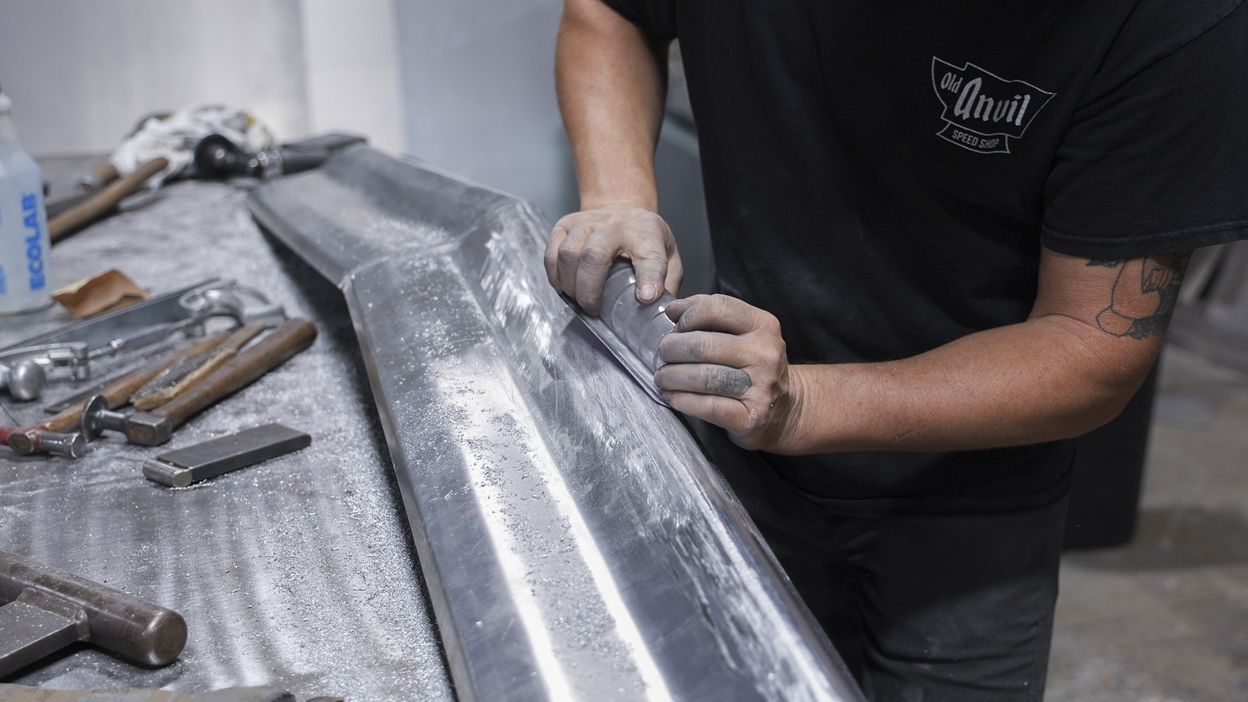 08 Sanding and smoothing a handcrafted aluminum panel for a 1962 Chevy Impala