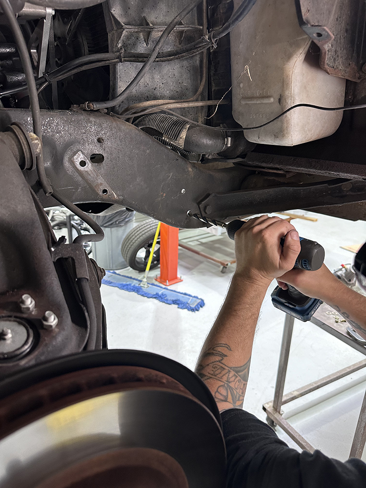 09 Drilling into the truck’s frame to mount the new rack and pinion steering bracket